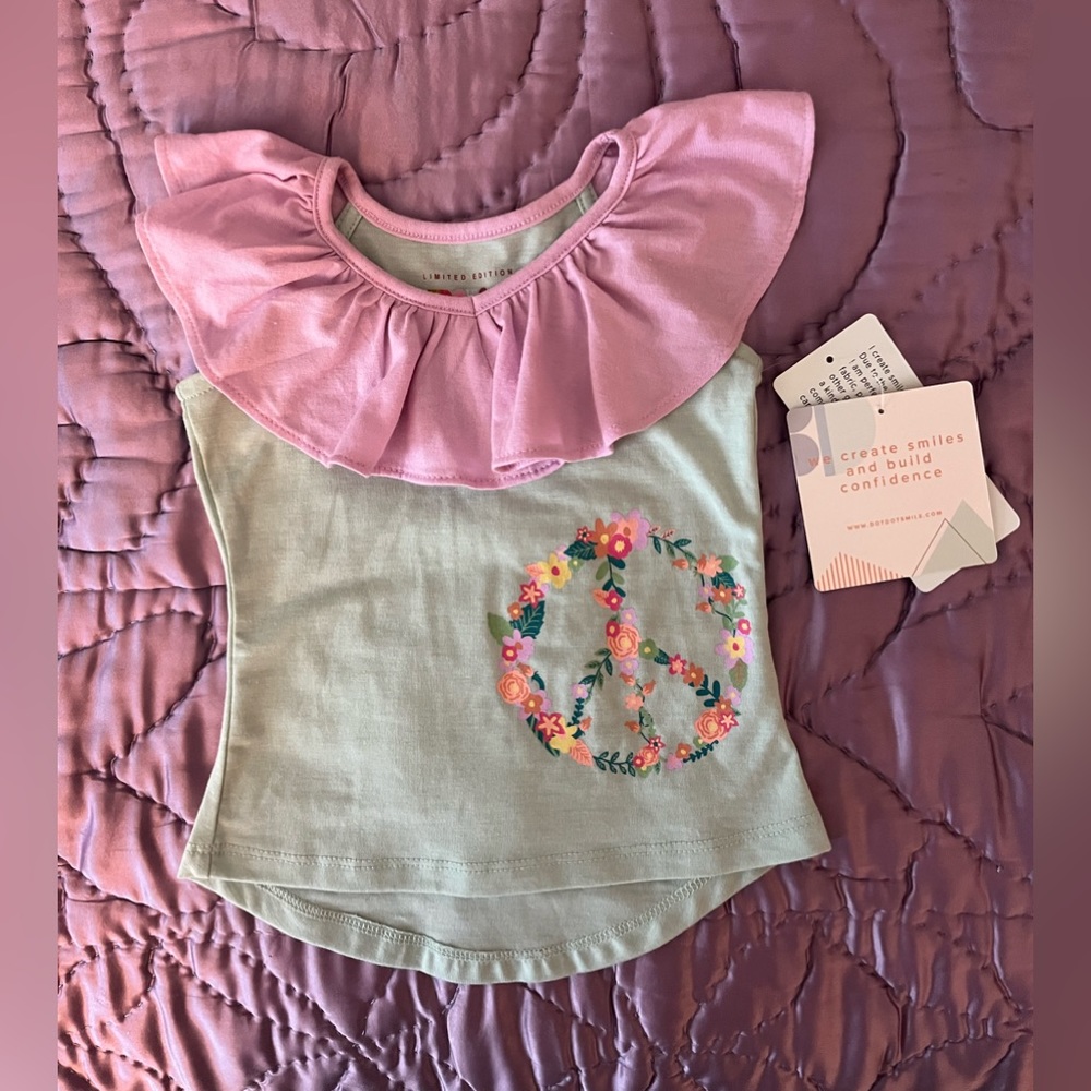 NWT Sleeveless shirt with flowered peace sign, girls 6-12 months.